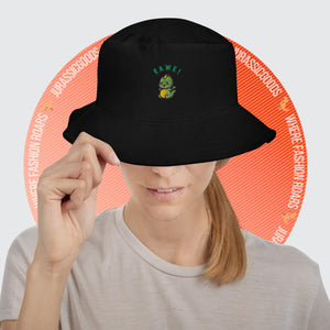 Woman wearing the Black Baby Dino Bucket Hat, showcasing its sleek design and cute embroidered dinosaur.