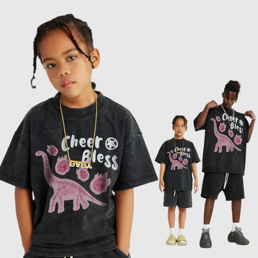 An adult with a kids wearing the dino streetwear hip hop tee.